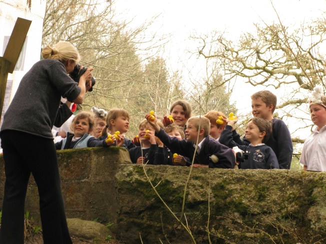 The Newspaper Photographer Getting Her Shot